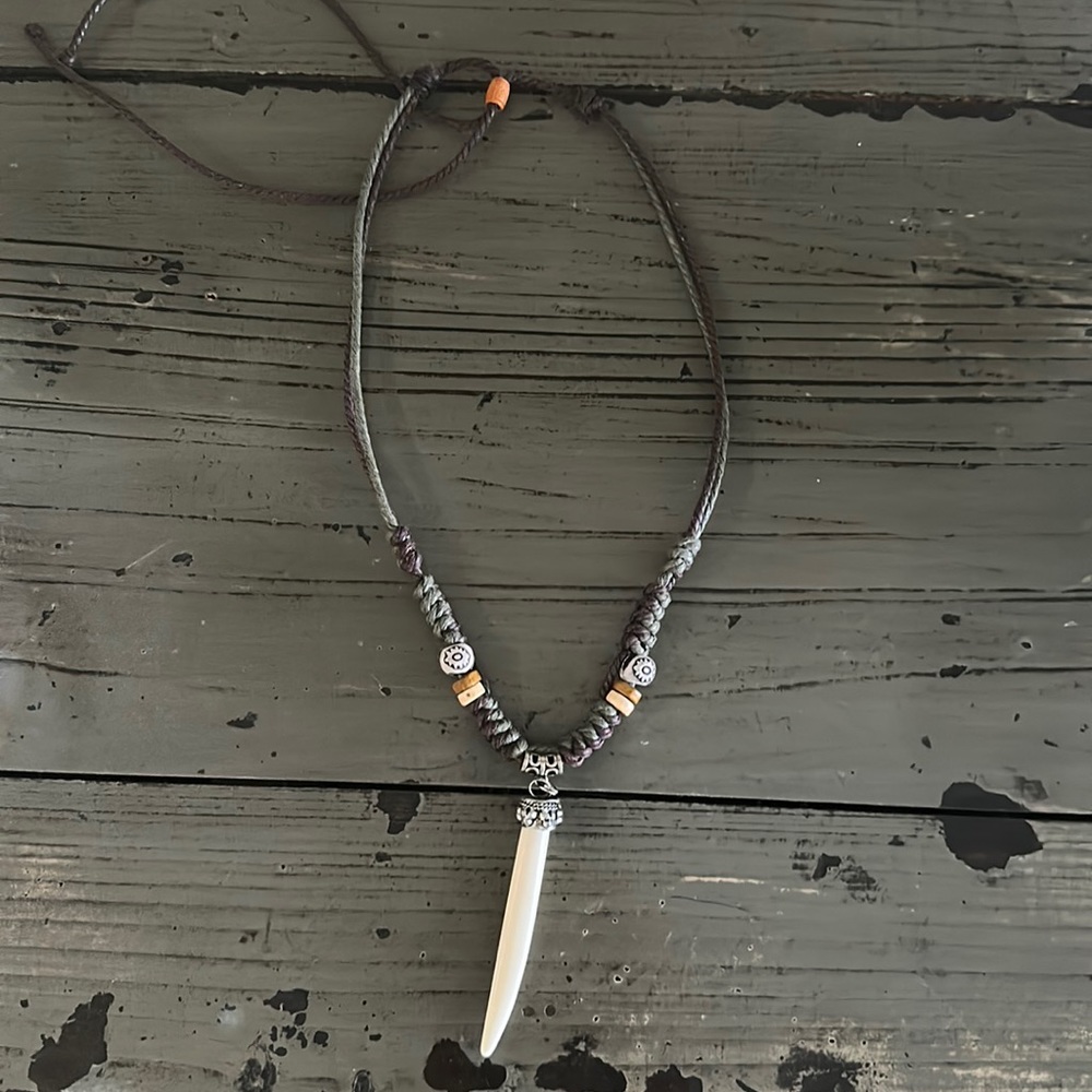 adjustable knotted necklace with carved bone pendant